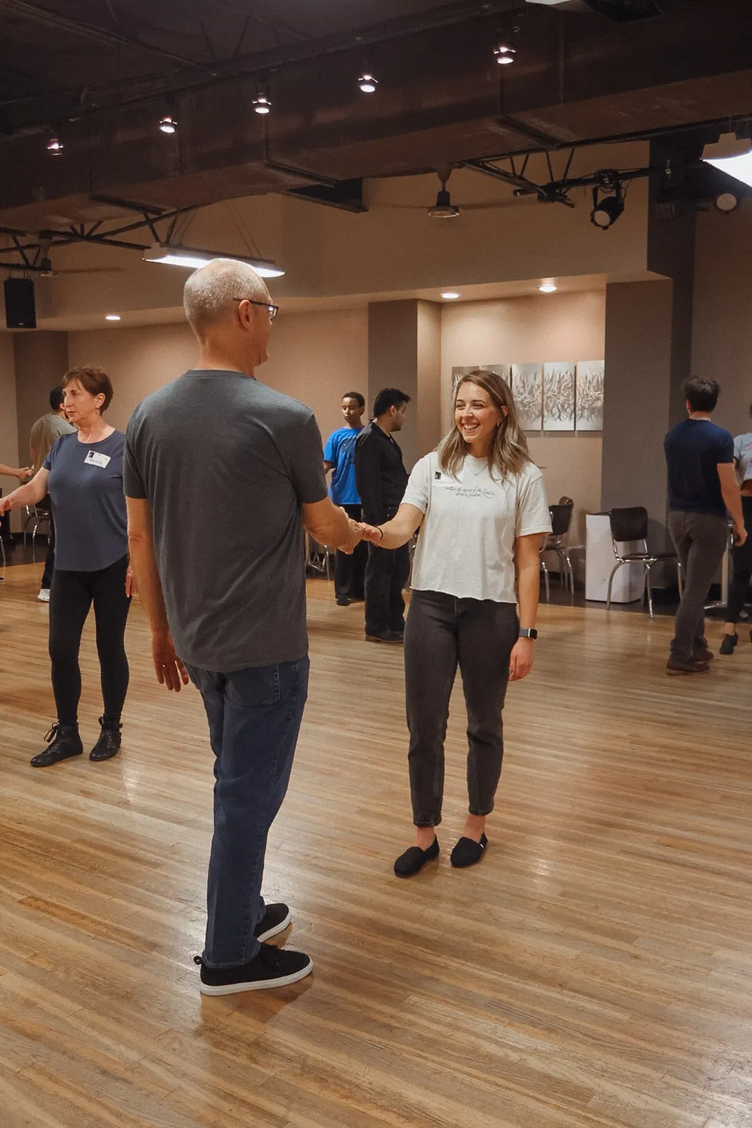 Student smiling while dancing at Studio 22